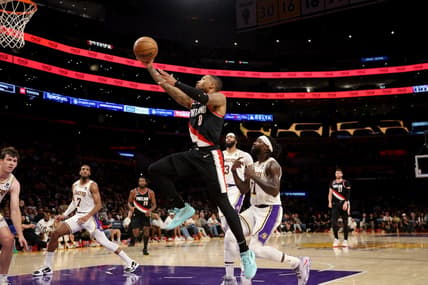 Oct 23, 2022; Los Angeles, California, USA;  Portland Trail Blazers guard Damian Lillard (0) goes to the basket during the second quarter against the Los Angeles Lakers at Crypto.com Arena. Mandatory Credit: Kiyoshi Mio-USA TODAY Sports