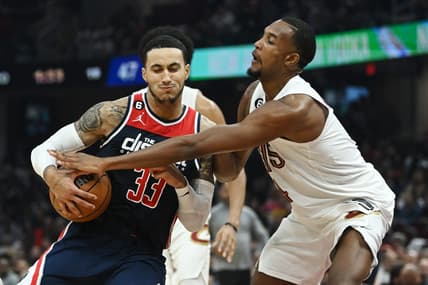 Oct 23, 2022; Cleveland, Ohio, USA; Washington Wizards forward Kyle Kuzma (33) drives to the basket against Cleveland Cavaliers forward Evan Mobley (4) during the first half at Rocket Mortgage FieldHouse. Mandatory Credit: Ken Blaze-USA TODAY Sports