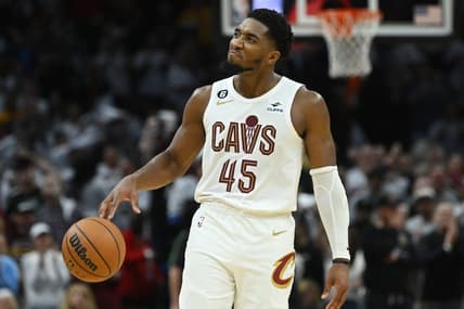 Oct 23, 2022; Cleveland, Ohio, USA; Cleveland Cavaliers guard Donovan Mitchell (45) holds the ball as time expires during overtime against the Washington Wizards at Rocket Mortgage FieldHouse. Mandatory Credit: Ken Blaze-USA TODAY Sports