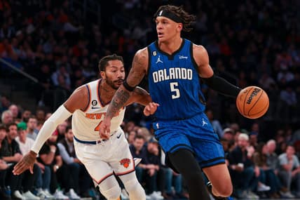 Oct 24, 2022; New York, New York, USA; Orlando Magic forward Paolo Banchero (5) dribbles as New York Knicks guard Derrick Rose (4) defends during the first half at Madison Square Garden. Mandatory Credit: Vincent Carchietta-USA TODAY Sports