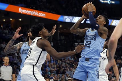 Oct 24, 2022; Memphis, Tennessee, USA;  Memphis Grizzlies guard Ja Morant (12) shoots during the first half against the Brooklyn Nets at FedExForum. Mandatory Credit: Petre Thomas-USA TODAY Sports