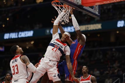 Oct 25, 2022; Washington, District of Columbia, USA; Detroit Pistons center Jalen Duren (0) attempts to dunk the ball as Washington Wizards center Daniel Gafford (21) defends in the second quarter at Capital One Arena. Mandatory Credit: Geoff Burke-USA TODAY Sports