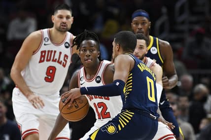 Oct 26, 2022; Chicago, Illinois, USA; Chicago Bulls guard Ayo Dosunmu (12) defends Indiana Pacers guard Tyrese Haliburton (0) during the first half at the  United Center. Mandatory Credit: Matt Marton-USA TODAY Sports