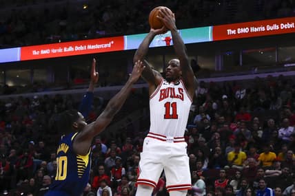 Oct 26, 2022; Chicago, Illinois, USA; Chicago Bulls forward DeMar DeRozan (11) shoots the ball over Indiana Pacers guard Bennedict Mathurin (00) during the first half at the  United Center. Mandatory Credit: Matt Marton-USA TODAY Sports