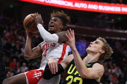 Oct 26, 2022; Salt Lake City, Utah, USA; Houston Rockets guard Jalen Green (4) drives with the ball against Utah Jazz forward Lauri Markkanen (23) in the first quarter at Vivint Arena. Mandatory Credit: Rob Gray-USA TODAY Sports