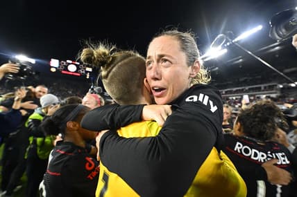 Oct 29, 2022; Washington, D.C., USA; Portland Thorns FC defender Meghan Klingenberg (25) celebrates with Portland Thorns FC goalkeeper Bella Bixby (1) after defeating the Kansas City Current in the NWSL championship game at Audi Field. Mandatory Credit: Brad Mills-USA TODAY Sports