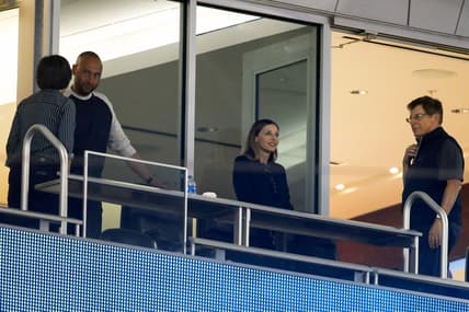 May 21, 2021; Miami, Florida, USA; from left: Miami Marlins general manager Kim Ng, and chief executive officer Derek Jeter, and chief operating officer Caroline O'Connor, and chairman & principal owner Bruce Sherman, attend a game against the New York Mets at loanDepot Park. Mandatory Credit: Sam Navarro-USA TODAY Sports