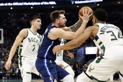 Apr 3, 2022; Milwaukee, Wisconsin, USA;  Dallas Mavericks guard Luka Doncic (77) drives for the basket against Milwaukee Bucks forward Giannis Antetokounmpo (34) during the second quarter at Fiserv Forum. Mandatory Credit: Jeff Hanisch-USA TODAY Sports
