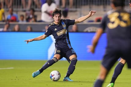 Jul 8, 2022; Chester, Pennsylvania, USA; Philadelphia Union midfielder Paxten Aaronson (30) shoots the ball against D.C. United at Subaru Park. Mandatory Credit: Mitchell Leff-USA TODAY Sports