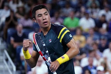 Sep 3, 2022; Flushing, NY, USA; Brandon Nakashima of the United States reacts after winning the first set against Jannik Sinner of Italy on day six of the 2022 U.S. Open tennis tournament at USTA Billie Jean King Tennis Center. Mandatory Credit: Danielle Parhizkaran-USA TODAY Sports
