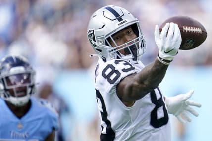 Sep 25, 2022; Nashville, Tennessee, USA; Las Vegas Raiders tight end Darren Waller (83) just misses a catch during the second quarter against the Tennessee Titans at Nissan Stadium. Mandatory Credit: Andrew Nelles-USA TODAY Sports