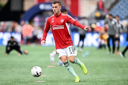 Oct 1, 2022; Foxborough, Massachusetts, USA; Atlanta United defender Brooks Lennon (11) kicks the ball during warmups before a game against the New England Revolution at Gillette Stadium. Mandatory Credit: Brian Fluharty-USA TODAY Sports