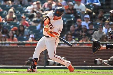 Oct 1, 2022; San Francisco, California, USA; San Francisco Giants right fielder Joc Pederson (23) hits a single against the Arizona Diamondbacks during the third inning at Oracle Park. Mandatory Credit: Robert Edwards-USA TODAY Sports