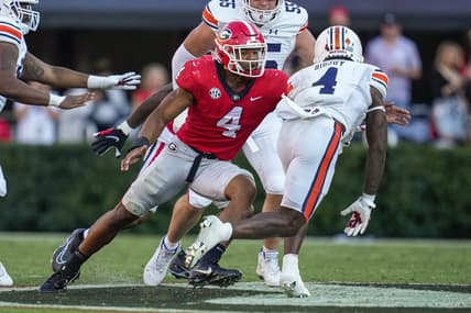 Oct 8, 2022; Athens, Georgia, USA; Georgia Bulldogs linebacker Nolan Smith (4) tackles Auburn Tigers running back Tank Bigsby (4) at Sanford Stadium. Mandatory Credit: Dale Zanine-USA TODAY Sports