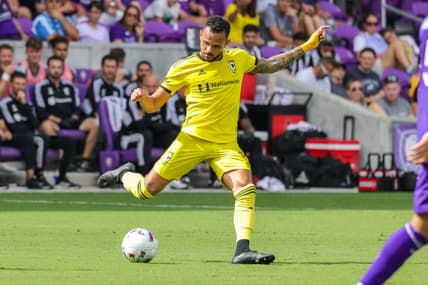 Oct 9, 2022; Orlando, Florida, USA; Columbus Crew midfielder Artur (8) kicks the ball during the first half against the Orlando City at Exploria Stadium. Mandatory Credit: Mike Watters-USA TODAY Sports