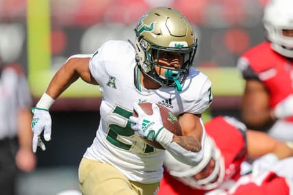 Oct 8, 2022; Cincinnati, Ohio, USA; South Florida Bulls running back Brian Battie (21) runs with the ball against the Cincinnati Bearcats in the first half at Nippert Stadium. Mandatory Credit: Katie Stratman-USA TODAY Sports