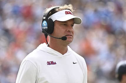 Oct 15, 2022; Oxford, Mississippi, USA; Mississippi Rebels head coach Lane Kiffin walks off the field during a timeout during the first quarter of the game against the Auburn Tigers at Vaught-Hemingway Stadium. Mandatory Credit: Matt Bush-USA TODAY Sports