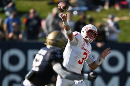 Oct 22, 2022; Annapolis, Maryland, USA;  Houston Cougars quarterback Clayton Tune (3) throws a sNavy Midshipmen linebacker Jianni Woodson-Brooks (52) drops in overage at Navy-Marine Corps Memorial Stadium. Mandatory Credit: Tommy Gilligan-USA TODAY Sports