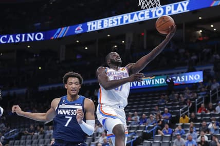 Oct 23, 2022; Oklahoma City, Oklahoma, USA; Oklahoma City Thunder forward Eugene Omoruyi (97) goes to the basket around Minnesota Timberwolves forward Wendell Moore Jr. (7) during the second half at Paycom Center. Minnesota won 116-106. Mandatory Credit: Alonzo Adams-USA TODAY Sports