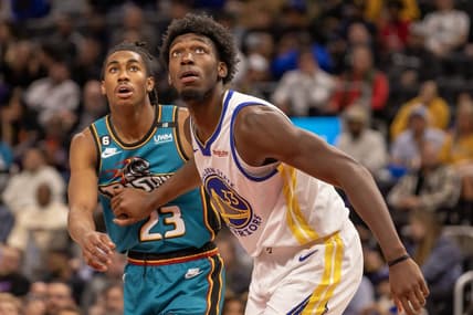 Oct 30, 2022; Detroit, Michigan, USA; Golden State Warriors center James Wiseman (33) blocks out Detroit Pistons guard Jaden Ivey (23) after a free throw during  the second half at Little Caesars Arena. Mandatory Credit: David Reginek-USA TODAY Sports