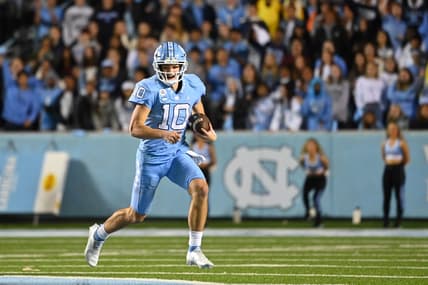 Oct 29, 2022; Chapel Hill, North Carolina, USA; *North Carolina Tar Heels quarterback Drake Maye (10) with the ball in the third quarter at Kenan Memorial Stadium. Mandatory Credit: Bob Donnan-USA TODAY Sports