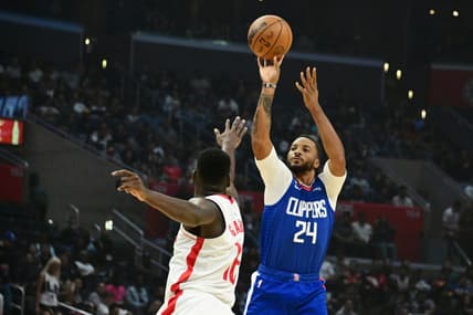 Oct 31, 2022; Los Angeles, California, USA; LA Clippers forward Norman Powell (24) shoots the ball over Houston Rockets forward Usman Garuba (16) in the first half  at Crypto.com Arena. Mandatory Credit: Richard Mackson-USA TODAY Sports