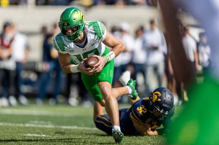 Oct 29, 2022; Berkeley, California, USA;  Oregon quarterback Bo Nix (10) runs the ball against The California Golden Bears during the second quarter at FTX Field at California Memorial Stadium. Mandatory Credit: John Hefti-USA TODAY Sports