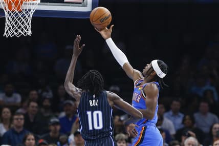 Nov 1, 2022; Oklahoma City, Oklahoma, USA; Oklahoma City Thunder guard Shai Gilgeous-Alexander (2) goes up for a basket as Orlando Magic center Bol Bol (10) defends during the first quarter at Paycom Center. Mandatory Credit: Alonzo Adams-USA TODAY Sports
