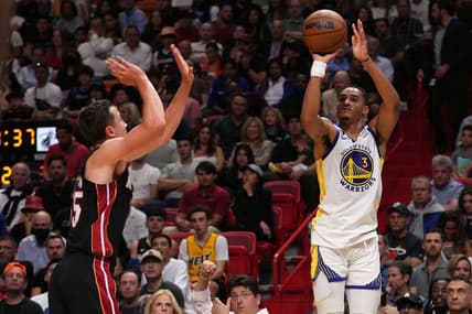 Nov 1, 2022; Miami, Florida, USA; Golden State Warriors guard Jordan Poole (3) attempts a three point shot on Miami Heat guard Duncan Robinson (55) during the first half at FTX Arena. Mandatory Credit: Jasen Vinlove-USA TODAY Sports
