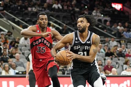 Nov 2, 2022; San Antonio, Texas, USA; San Antonio Spurs forward Keita Bates-Diop (31) drives to the basket against Toronto Raptors center Christian Koloko (35) during the first half at AT&T Center. Mandatory Credit: Scott Wachter-USA TODAY Sports
