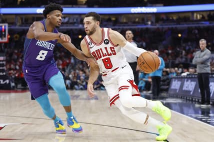 Nov 2, 2022; Chicago, Illinois, USA; Chicago Bulls guard Zach LaVine (8) drives to the basket against Charlotte Hornets guard Dennis Smith Jr. (8) during the first half at United Center. Mandatory Credit: Kamil Krzaczynski-USA TODAY Sports