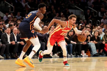 Nov 2, 2022; New York, New York, USA; Atlanta Hawks guard Trae Young (11) controls the ball against New York Knicks guard RJ Barrett (9) during the first quarter at Madison Square Garden. Mandatory Credit: Brad Penner-USA TODAY Sports