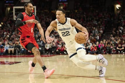 Nov 2, 2022; Portland, Oregon, USA; Memphis Grizzlies guard Desmond Bane (22) drives to the basket against Portland Trail Blazers guard Keon Johnson (6) during the second half at Moda Center. Mandatory Credit: Troy Wayrynen-USA TODAY Sports