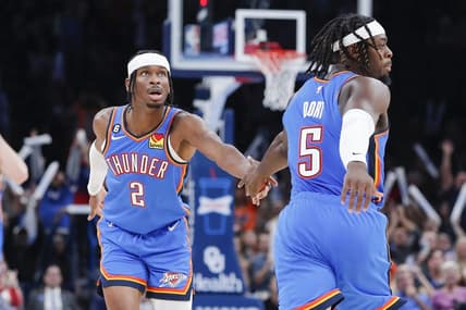 Nov 3, 2022; Oklahoma City, Oklahoma, USA; Oklahoma City Thunder guard Shai Gilgeous-Alexander (2) and Oklahoma City Thunder forward Luguentz Dort (5) high five following a basket against the Denver Nuggets during the second half at Paycom Center. Denver won 122-110. Mandatory Credit: Alonzo Adams-USA TODAY Sports