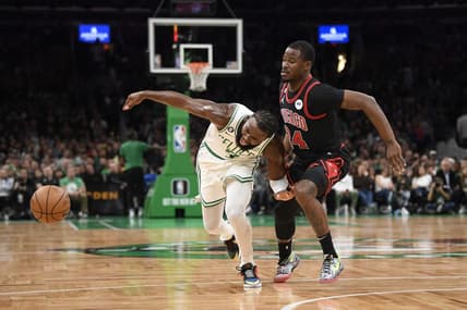 Nov 4, 2022; Boston, Massachusetts, USA;  Boston Celtics guard Jaylen Brown (7) loses the ball while Chicago Bulls forward Javonte Green (24) defends during the first half at TD Garden. Mandatory Credit: Bob DeChiara-USA TODAY Sports