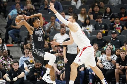 Nov 4, 2022; San Antonio, Texas, USA; San Antonio Spurs guard Devin Vassell (24) looks to the pass the ball while defended by Los Angeles Clippers center Ivica Zubac (40) at AT&T Center. Mandatory Credit: Scott Wachter-USA TODAY Sports