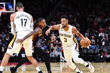 Nov 5, 2022; Atlanta, Georgia, USA; New Orleans Pelicans guard CJ McCollum (3) drives the ball past Atlanta Guard Dejounte Murray (5) in the first quarter at State Farm Arena. Mandatory Credit: Larry Robinson-USA TODAY Sports