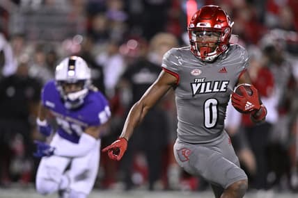 Nov 5, 2022; Louisville, Kentucky, USA;  Louisville Cardinals wide receiver Tyler Hudson (0) runs the ball against the James Madison Dukes during the first half at Cardinal Stadium. Mandatory Credit: Jamie Rhodes-USA TODAY Sports