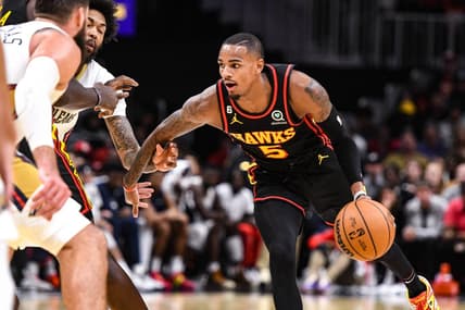 Nov 5, 2022; Atlanta, Georgia, USA; Atlanta Hawks guard Dejounte Murray (5) drives the ball against the New Orleans Pelicans in the fourth quarter at State Farm Arena. Mandatory Credit: Larry Robinson-USA TODAY Sports