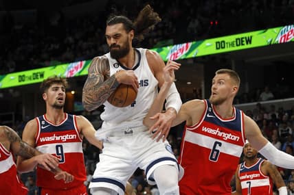 Nov 6, 2022; Memphis, Tennessee, USA; Memphis Grizzlies center Steven Adams (4) collects a rebound over Washington Wizards forward Deni Avdija (9) and Washington Wizards center Kristaps Porzingis (6) during the second quarter at FedExForum. Mandatory Credit: Petre Thomas-USA TODAY Sports