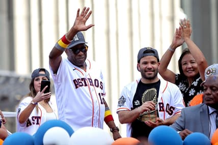 Nov 7, 2022; Houston, Texas, USA; Houston Astros manager Dusty Baker Jr. (12, left) and Houston Astros second baseman Jose Altuve (27) both wave to the crowd atop a parade vehicle during the Houston Astros Championship Parade in Houston, TX. Mandatory Credit: Erik Williams-USA TODAY Sports