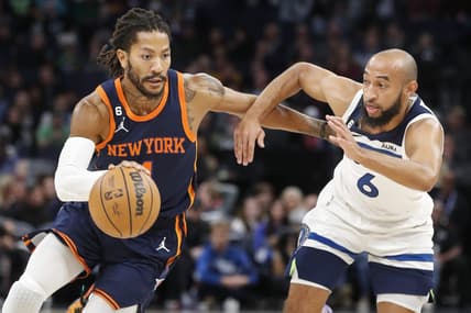 Nov 7, 2022; Minneapolis, Minnesota, USA; New York Knicks guard Derrick Rose (4) drives to the basket around Minnesota Timberwolves guard Jordan McLaughlin (6) in the first quarter at Target Center. Mandatory Credit: Bruce Kluckhohn-USA TODAY Sports