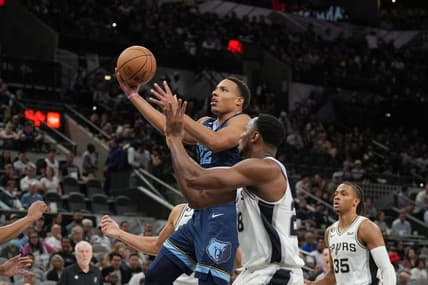 Nov 9, 2022; San Antonio, Texas, USA;  Memphis Grizzlies guard Desmond Bane (22) shoots in front of San Antonio Spurs center Charles Bassey (28) in the first half at the AT&T Center. Mandatory Credit: Daniel Dunn-USA TODAY Sports