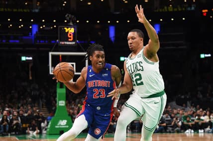 Nov 9, 2022; Boston, Massachusetts, USA; Detroit Pistons guard Jaden Ivey (23) drives to the basket while Boston Celtics forward Grant Williams (12) defends during the first half at TD Garden. Mandatory Credit: Bob DeChiara-USA TODAY Sports