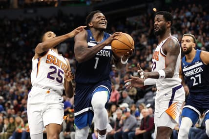Nov 9, 2022; Minneapolis, Minnesota, USA; Minnesota Timberwolves guard Anthony Edwards (1) drives to the basket while Phoenix Suns forward Mikal Bridges (25) defends during the second quarter at Target Center. Mandatory Credit: Matt Krohn-USA TODAY Sports