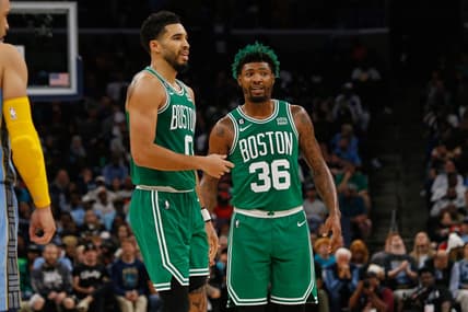 Nov 7, 2022; Memphis, Tennessee, USA; Boston Celtics forward Jayson Tatum (0) and Boston Celtics guard Marcus Smart (36) talk during the second half against the Memphis Grizzlies at FedExForum. Mandatory Credit: Petre Thomas-USA TODAY Sports