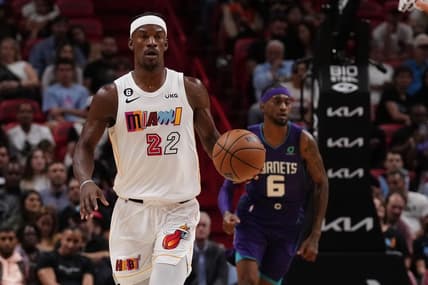 Nov 10, 2022; Miami, Florida, USA; Miami Heat forward Jimmy Butler (22) dribbles the ball up the court against the Charlotte Hornets during the first half at FTX Arena. Mandatory Credit: Jasen Vinlove-USA TODAY Sports