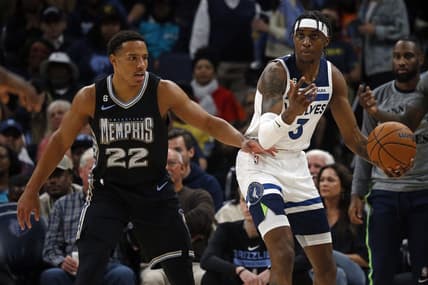 Nov 11, 2022; Memphis, Tennessee, USA; Minnesota Timberwolves forward Jaden McDaniels (3) looks for an open teammate as Memphis Grizzlies guard Desmond Bane (22) defends during the first half at FedExForum. Mandatory Credit: Petre Thomas-USA TODAY Sports