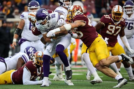 Nov 12, 2022; Minneapolis, Minnesota, USA;Minnesota Golden Gophers linebacker Cody Lindenberg (45) tackles Northwestern Wildcats quarterback Brendan Sullivan (10) during the first quarter at Huntington Bank Stadium. Mandatory Credit: Matt Krohn-USA TODAY Sports