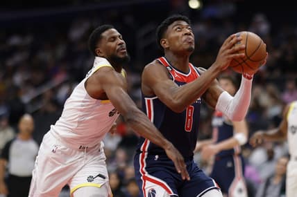 Nov 12, 2022; Washington, District of Columbia, USA; Washington Wizards forward Rui Hachimura (8) dribbles the ball as Utah Jazz guard Malik Beasley (5) defends in the first quarter at Capital One Arena. Mandatory Credit: Geoff Burke-USA TODAY Sports
